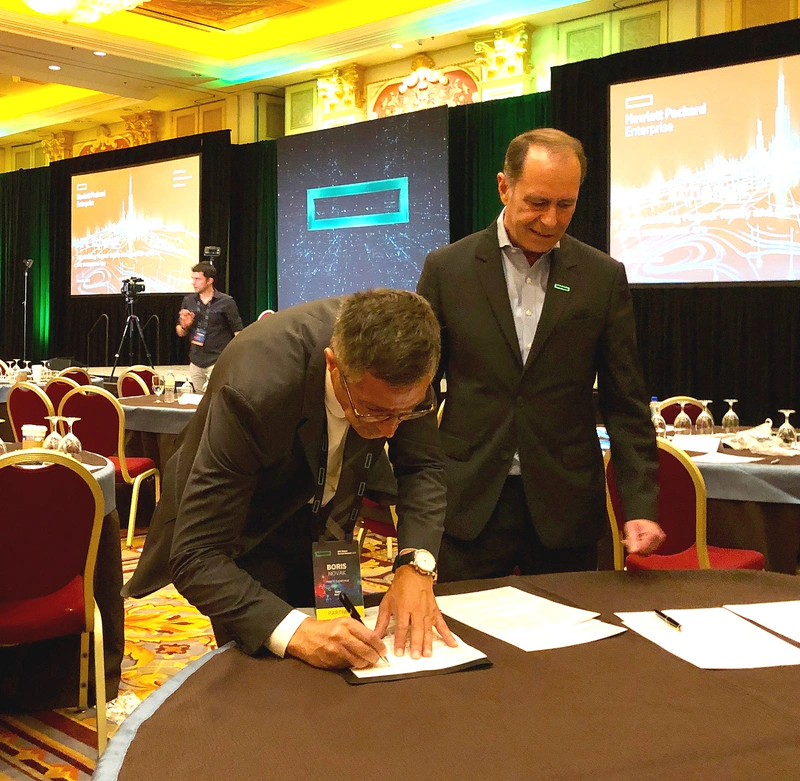 Signing the MoU, Left to Right - Boris Novak, CEO, Post of Slovenia, and Xavier Poisson, VP Cloud and SP, HPE