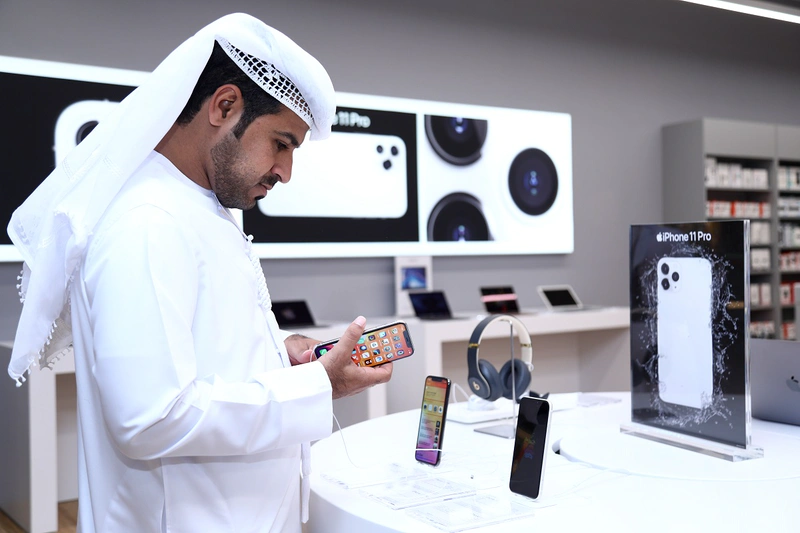 Checking over the latest iPhones at the new iSTYLE store in Al Ain