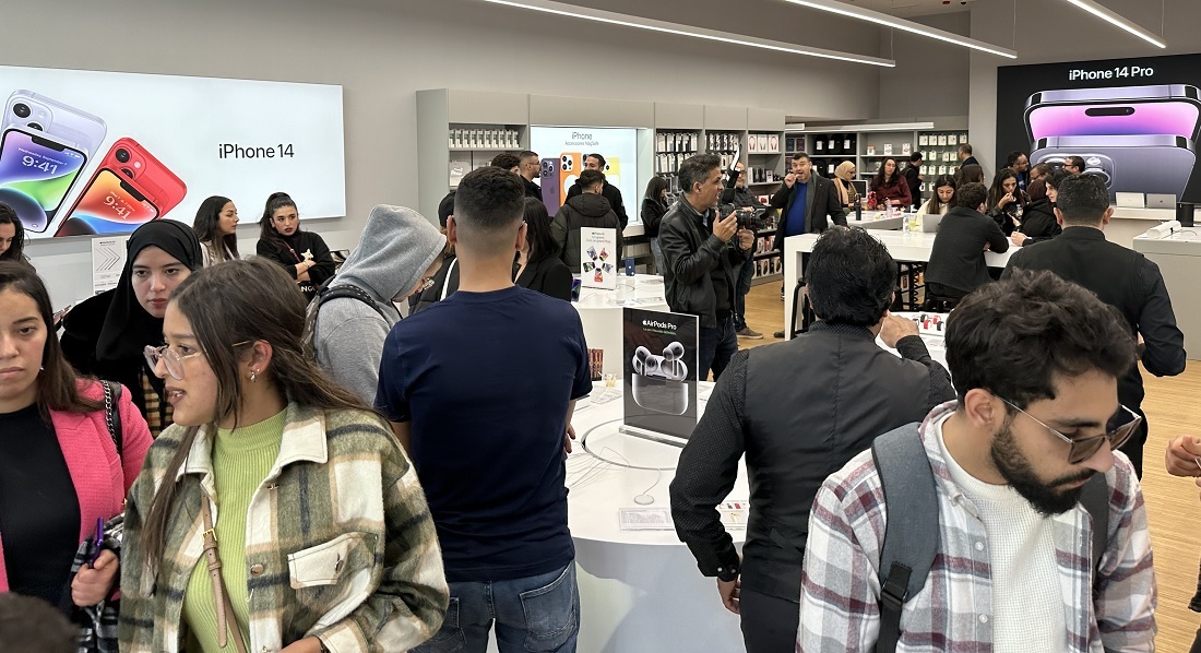 people explore the interior of a hi tech store