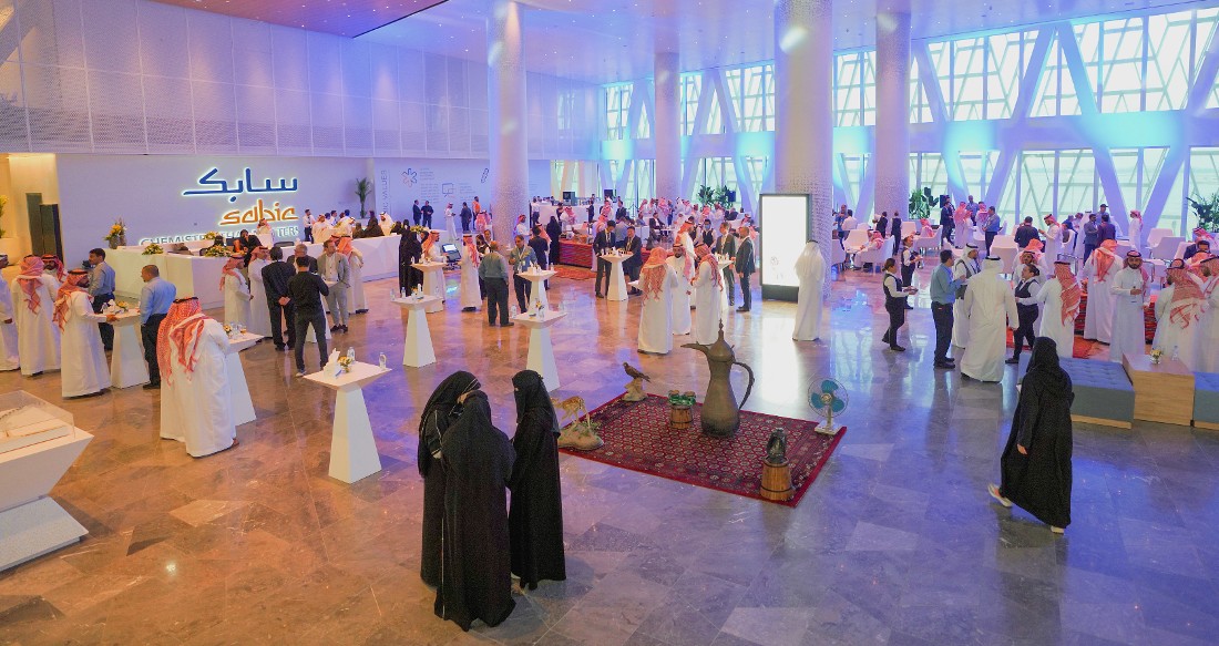 Overall view of an event space with many people present