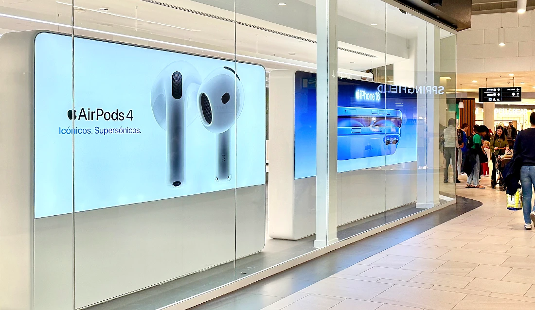 hi tech store exterior showing large digital screens